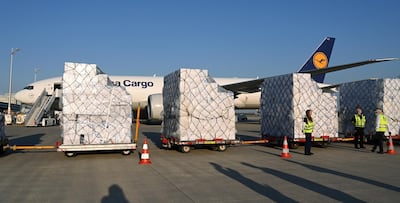 Batches of 8-million protective masks are being unloaded from a Lufthansa airplane at the Franz-Josef-Strauss airport in Munich, southern Germany, having arrived from Shanghai. AFP