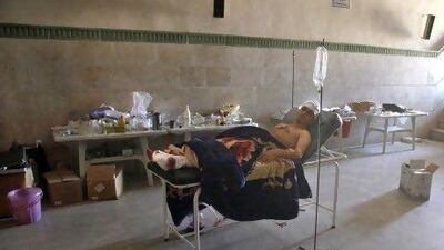 Mahmoud, a 21-year-old Palestinian resident of Syria, rests in a field hospital after being treated for three gunshot wounds. “As soon as my head was hit, I thought, I’m dead,” he said.