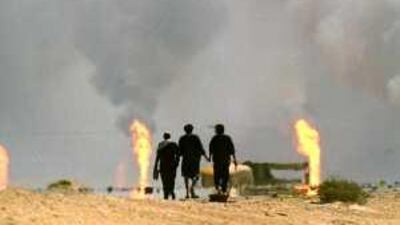 Three of the estimated 30,000 hostages seized during the Gulf War head toward Kuwait after being released by Iraq in March 1991. AFP