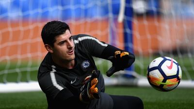 Thibaut Courtois warms up in nets before Chelsea's Premier League game against Watford at Stamford Bridge. David Ramos / Getty Images