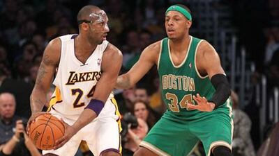 Kobe Bryant, left, led the scoring for the Los Angeles Lakers in their win over the Boston Celtics.
