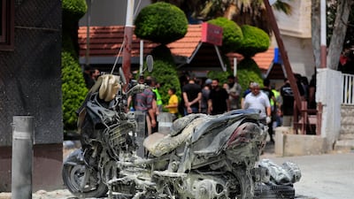 The burnt remains of motorcycle after an Israeli attack sit at Salah Ghandour Hospital in Bint Jbeil, southern Lebanon, on May 27, 2024. AP