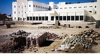 In the early years, doctors had to walk outside and through the heat to go from one outpatient clinic to another in the back lot. Today, air-conditioned pathways link them.