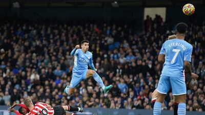 Man City's Joao Cancelo shoots against Brentford. AP
