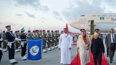 King Salman is welcomed by President of Tunisia Beji Caid Essebs upon his arrival in Tunis. EPA