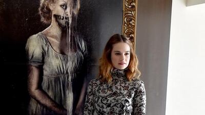 Downton Abbey star Lily James had to train hard for the action scenes in Pride and Prejudice and Zombies. Kevin Winter / Getty Images