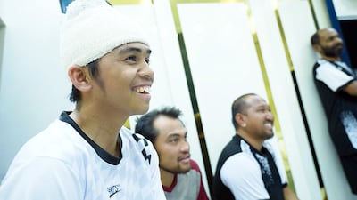 Crew members of the Eternity C cargo ship. It is unclear if they were speaking under duress. EPA