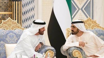 Sheikh Mohammed bin Zayed, Crown Prince of Abu Dhabi and Deputy Supreme Commander of the UAE Armed Forces, speaks with Sheikh Mohammed bin Rashid, Vice-President and Ruler of Dubai, during an iftar reception at the Presidential Palace. The latter announced sweeping changes to visa residency rules on Sunday. Rashed Al Mansoori / Crown Prince Court