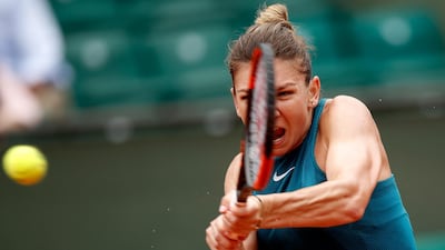 Simona Halep recovered from losing the first srt to win her delayed opening round match at the French Open. Yoan Valat / EPA