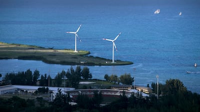 Wind turbines, part of a power plant donated by Masdar, on Mahe island in the in Seychelles. Silvia Razgova / The National
