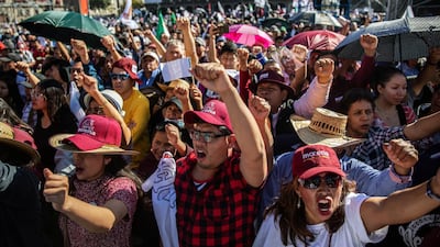 Supporters celebrate during the presidential inauguration event. Bloomberg