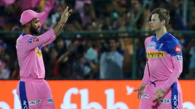 Steve Smith, right, after taking the catch that dismissed David Warner but also injured his elbow. AP Photo