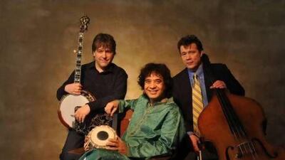 Zakir Hussain (tabla), alongside Edgar Meyer (upright bass), Béla Fleck (banjo). Photo courtesy RNH Events