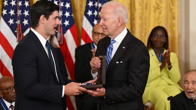 Mr Biden posthumously awards the Presidential Medal of Freedom to workers' rights lawyer Richard Trumka. It was accepted by his son, Richard Trumka Jr. AFP