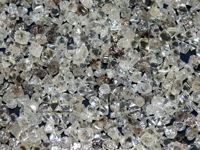 Loose, uncut diamonds by Alrosa, which is a Russian state-controlled miner. Photo: Alrosa