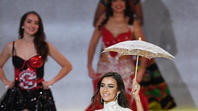 Miss Belgium Elena Castro Suarez performs during the final in the ExCel centre in London. EPA