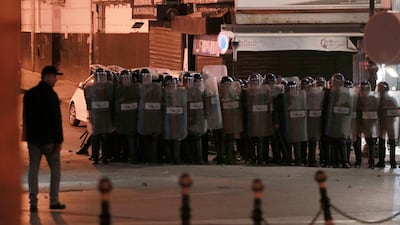 Riot police officers gather in Algiers after the presidential elections. Algerians — without a leader since April — voted for a new president or boycotted and held street protests against the elections decried by a massive pro-democracy movement that forced former leader Abdelaziz Bouteflika to resign. AP