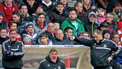 West Ham manager Sam Allardyce, centre, was very vocal on Sunday but his instructions fell on deaf ears as his side fell 5-0 at Nottingham Forest, a Championship team, in a FA Cup third round match. Julian Finney / Getty Images