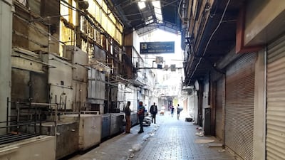 Tehran's old grand bazaar was closed as people protested in the streets over the economic situation. EPA / STR
