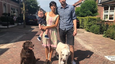 American expats Mike and Cristina Weeks with their son in a small town near Amsterdam, Netherlands. Mr Weeks is the founder of United Expats of the Netherlands, which opposes the proposal. Photo: Bloomberg