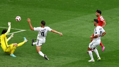 Jordan's Yazan Al Naimat scores their first goal. Reuters