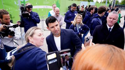 Manchester City's record goalscorer Sergio Aguero with supporters. AP