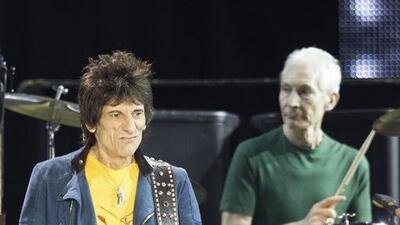 Ronnie Wood on guitar and Charlie Watts on drums. Neville Hopwood / Getty Images