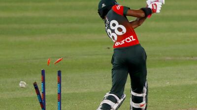 Bangladesh's Afif Hossain is bowled by Australia's Mitchell Starc.