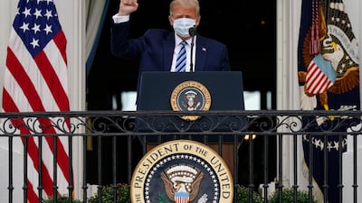 US President Donald Trump arrives to speak from the Blue Room Balcony of the White House to a crowd of supporters, in Washington. AP Photo, file