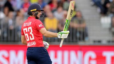 Jos Buttler celebrates reaching his half century. EPA