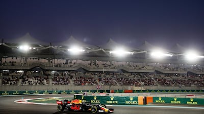 Max Verstappen as the lights in the stands shine bright. Getty Images
