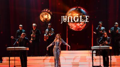 Tom McFarland, from front left, Lydia Kitto and Joshua Lloyd-Watson of Jungle also performed during the Brit Awards. AP