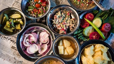 The traditional Egyptian street suhour includes a wide variety of side dishes such as these from Foul Mahrous in Garden City. David Degner for The National