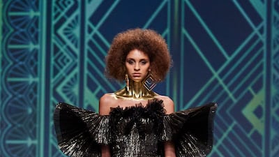 The Filipino designer remains on top of his game with eye-catching creations, including this decadent dress.