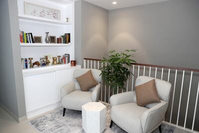 The couple have put in a reading nook on their landing upstairs. Pawan Singh / The National