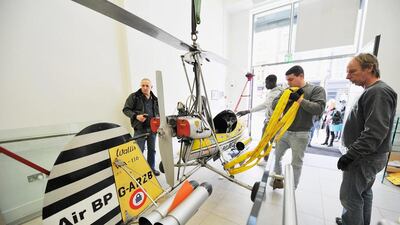 The Little Nellie used in the film You Only Live Twice is loaded in to the London Film Museum.