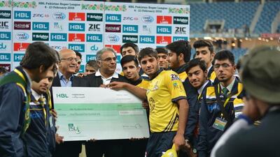 Mohammed Ashgar of Peshawar Zalmi is awarded man of the match after their Pakistan Super League win over Islamabad United on Friday. Photo Courtesy / PSL