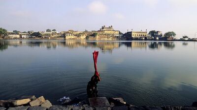 A woman washes clothes in Bhopal. The risk of toxic exposure for tourists in the city is very low – Bhopal’s main attractions lie well beyond the areas affected by the Union Carbide disaster 32 years ago. Getty Images
