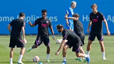 Barcelona's Ansu Fati, Oscar Mingueza and Gavi. Reuters