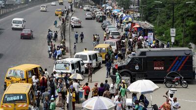 A police armoured vehicle is deployed at a bus station at a boundary between Lagos and neighbouring Ogun State, Nigeria. Police are being accused of AFP