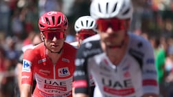 UAE Team Emirates-XRG rider Tadej Pogacar wearing the leader's red jersey at La Vuelta. Reuters
