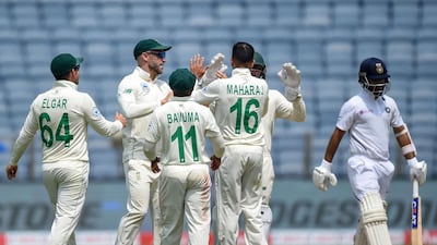 South Africa celebrate after the dismissal of India's Ajinkya Rahane, right. AFP