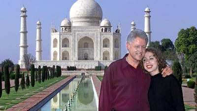 US President Bill Clinton and his daughter Chelsea tour the grounds of India's Taj Mahal on March 22, 2000. AFP