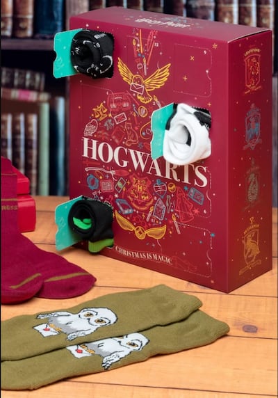 Open the doors to reveal 12 pairs of Potter-themed socks. Photo: Paladone