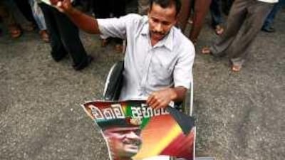 Supporters of Sarath Fonseka, whose party is likely to win a number of seats, call for his release at a rally in Colombo on Tuesday.