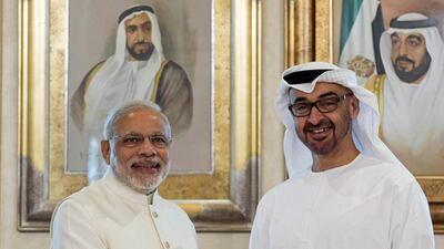 Sheikh Mohamed bin Zayed Al Nahyan, Crown Prince of Abu Dhabi and Deputy Supreme Commander of the UAE Armed Forces shakes hands with Narendra Modi, prime minister of India at the Emirates Palace hotel in Abu Dhabi. Ryan Carter / Crown Prince Court