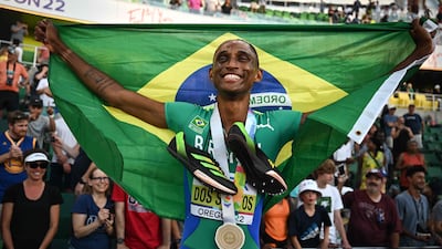 Alison Dos Santos celebrates after winning the men's 400m hurdles final during the World Athletics Championships. AFP