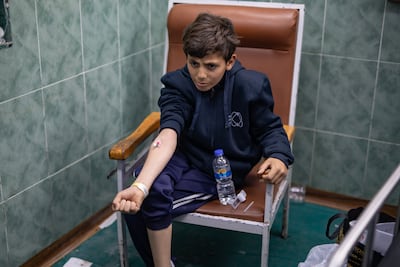 Nimer Al Nimer, a young Palestinian prisoner released by the Israeli army, receives medical attention in Rafah. EPA