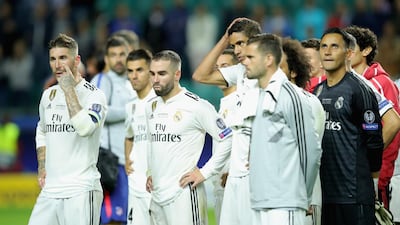 Sergio Ramos, left, of Real reacts with his teammates. Getty