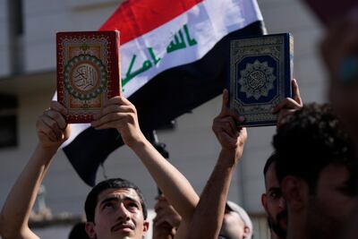 Demonstrators take part in a protest in front of the Swedish embassy in Baghdad on Friday in response to the burning of a copy of the Quran in Stockholm. AP